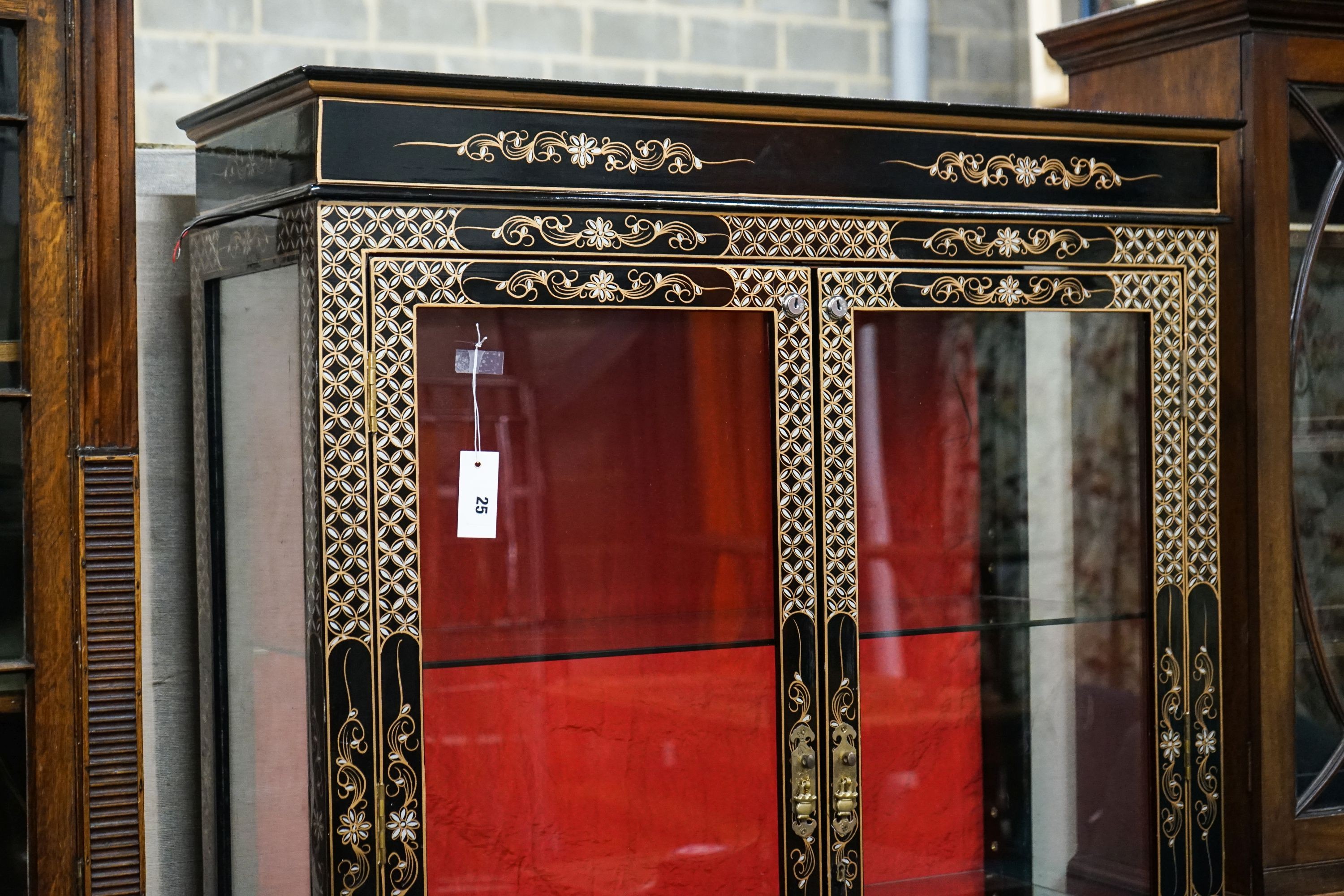 A Chinese style chinoiserie lacquer display cabinet with faux hardstone decoration, width 95cm, depth 38cm, height 183cm